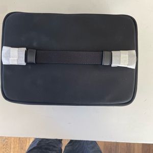Black Kate Spade makeup bag